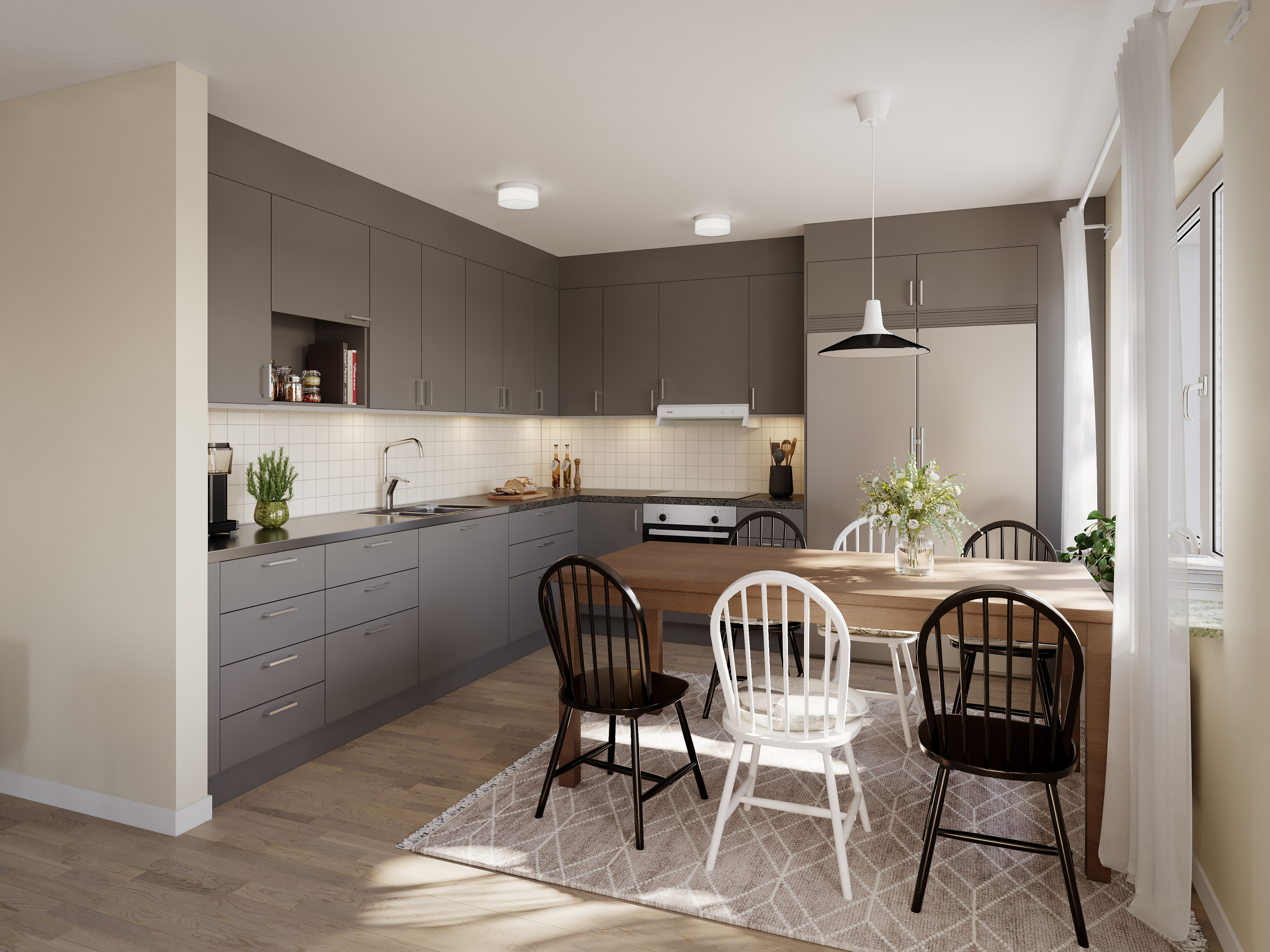 Matbord med sex sittplatser framför ett grått öppet kök